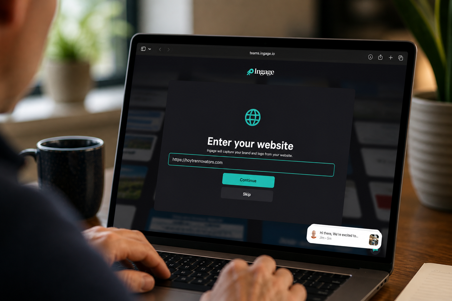 Contractor at his desk entering his website into Ingage
